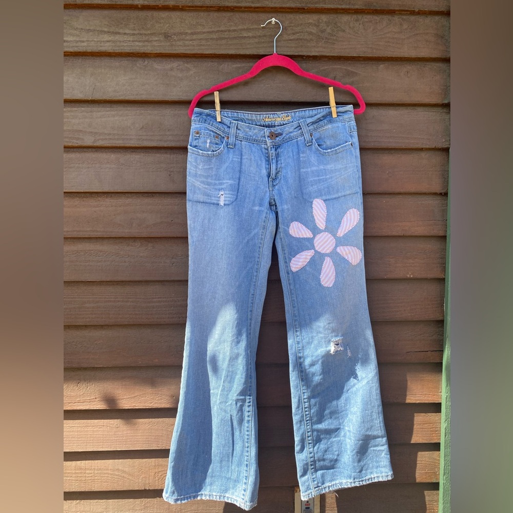 American Eagle Blue and Pink Flare Jeans with Floral Design